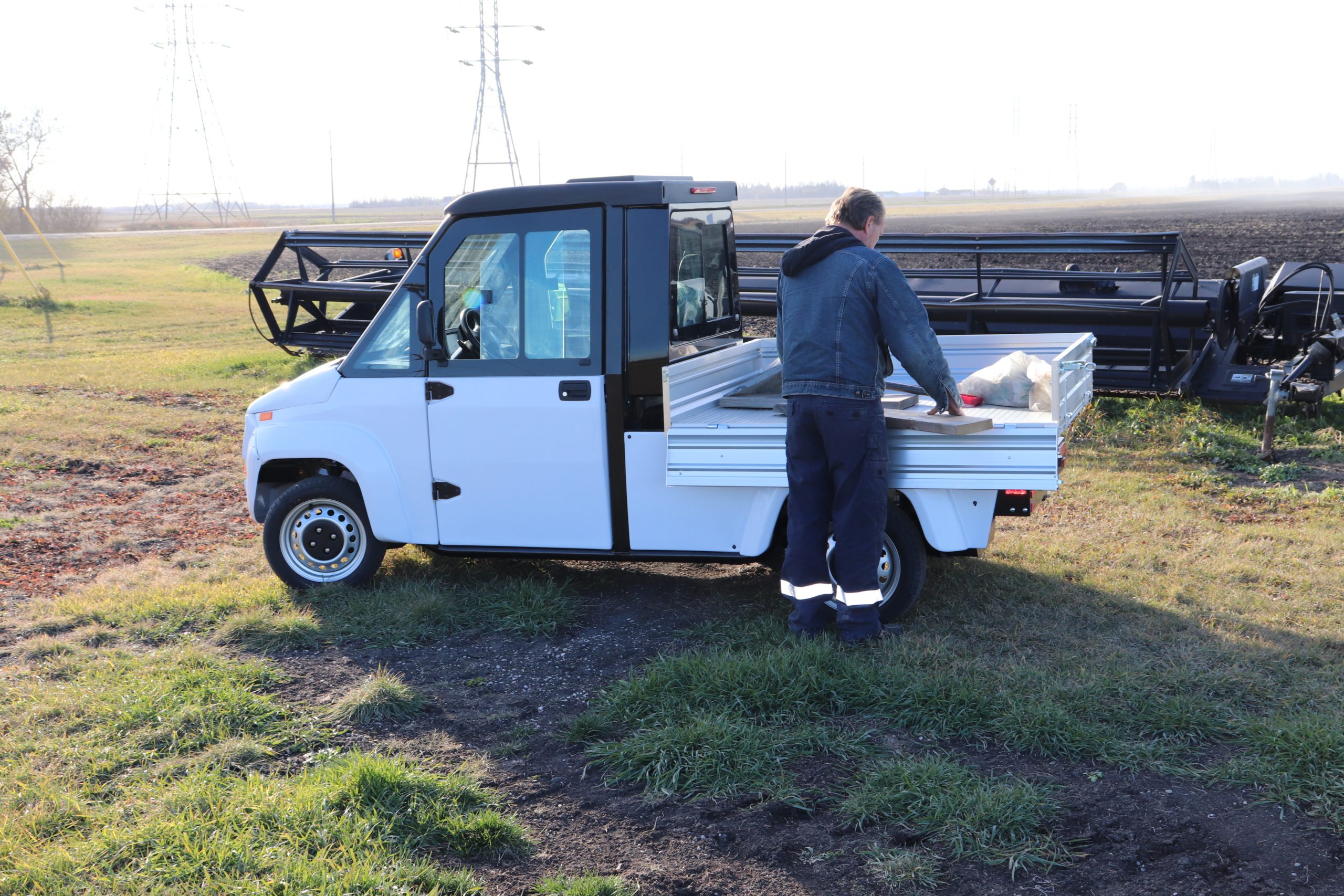 Electric Utility Vehicle on farm with person