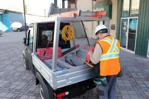 electric utility vehicle with ladder rack